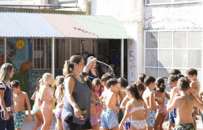 A school in Argentina lets students come to class in bathing suits and splash themselves with water because of the heat