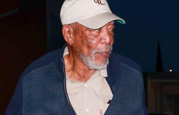 Morgan Freeman, photographed in public, at the entrance to a restaurant in Beverly Hills. He matched his outfit with the special glove he wears on his left hand