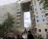 Russia: An apartment block partially collapsed after the bombing. There are at least 13 dead